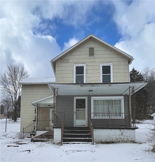 view of front of property featuring covered porch