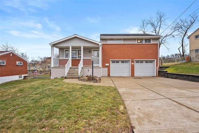 view of front of property with driveway, covered porch, brick siding, and a front yard