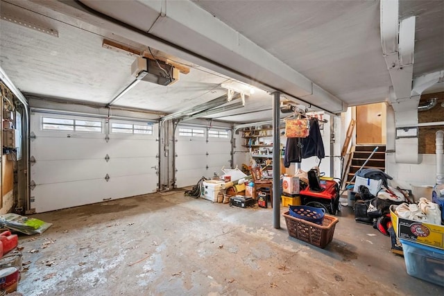 garage featuring a garage door opener