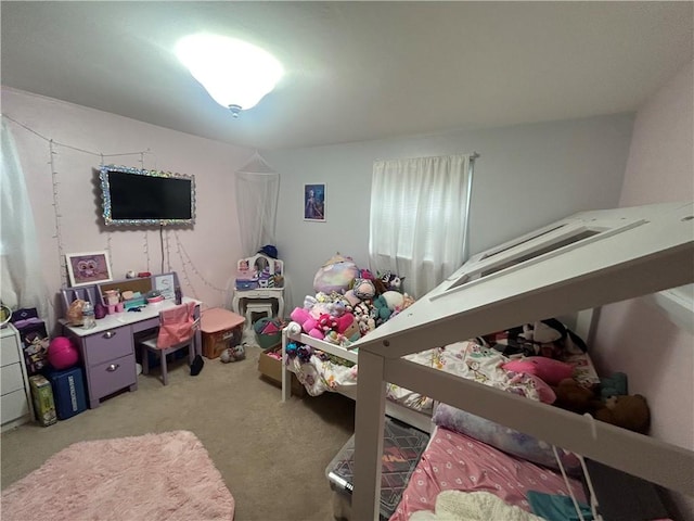 bedroom featuring light carpet