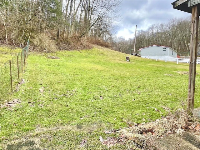 view of yard featuring fence