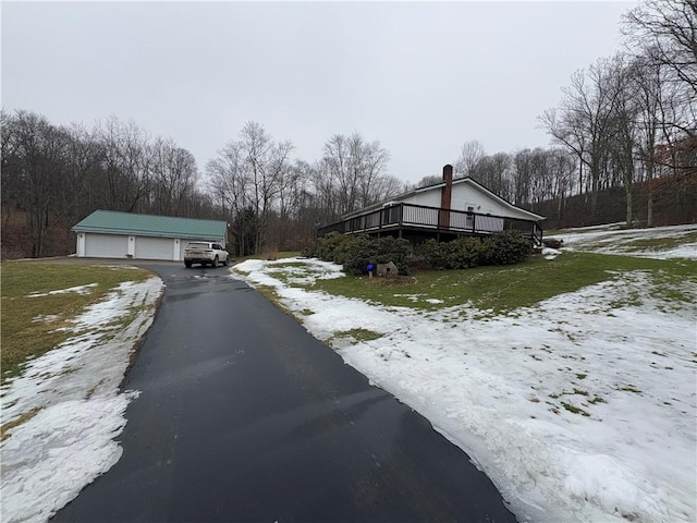 view of road with driveway