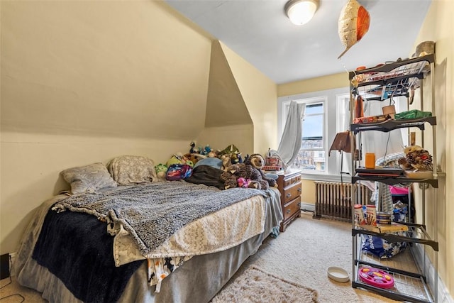 carpeted bedroom with radiator heating unit