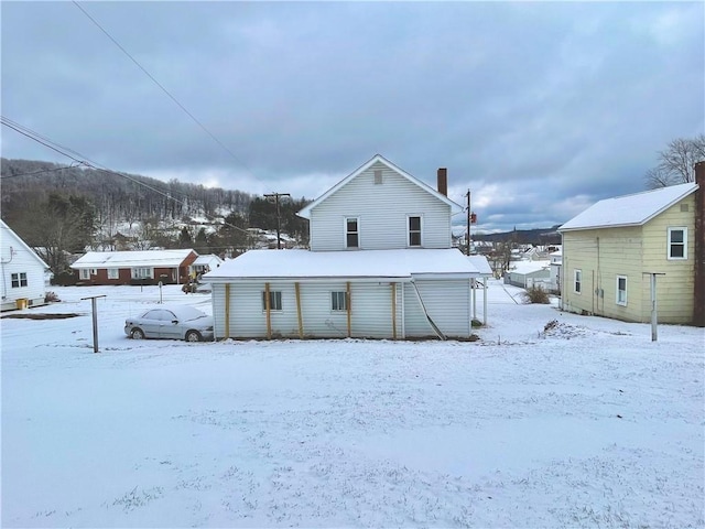 view of snow covered property