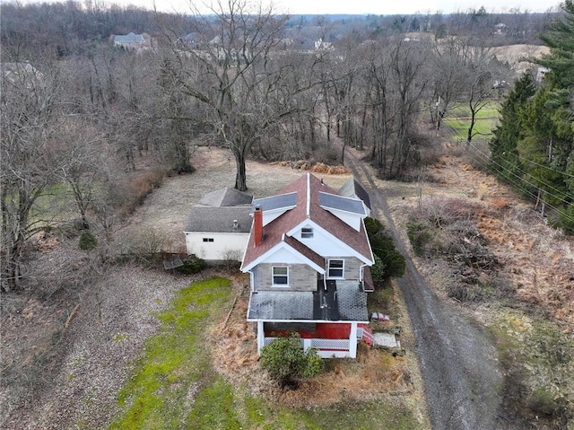 drone / aerial view with a view of trees