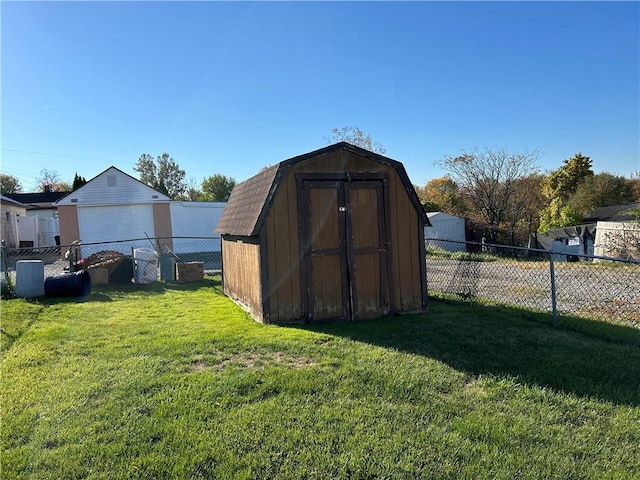 view of shed featuring a fenced backyard