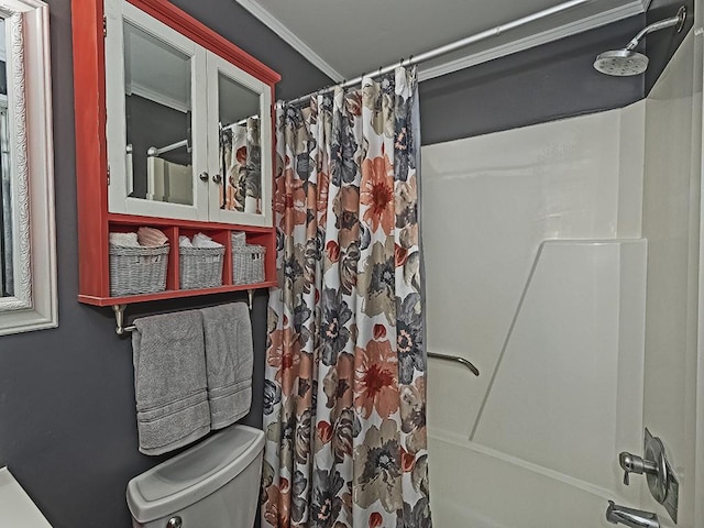 bathroom with toilet and crown molding