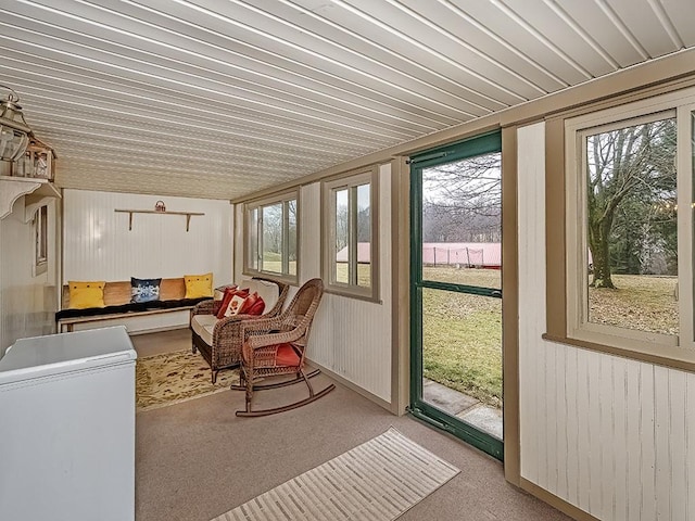 sunroom / solarium featuring a wealth of natural light