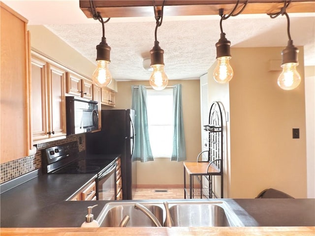 kitchen with range with electric stovetop, tasteful backsplash, dark countertops, hanging light fixtures, and black microwave