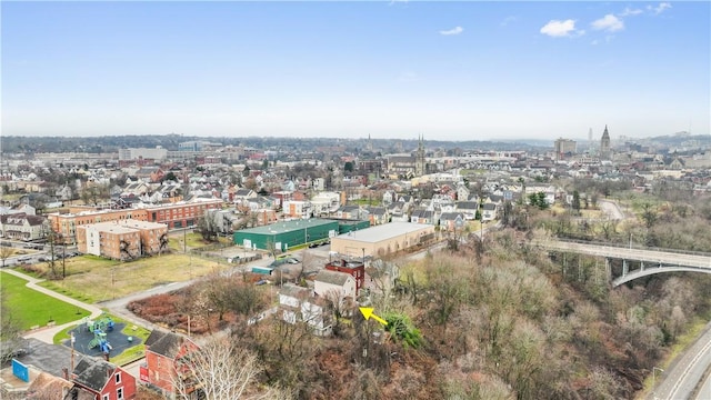 birds eye view of property with a city view