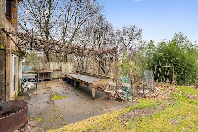 view of patio / terrace with fence