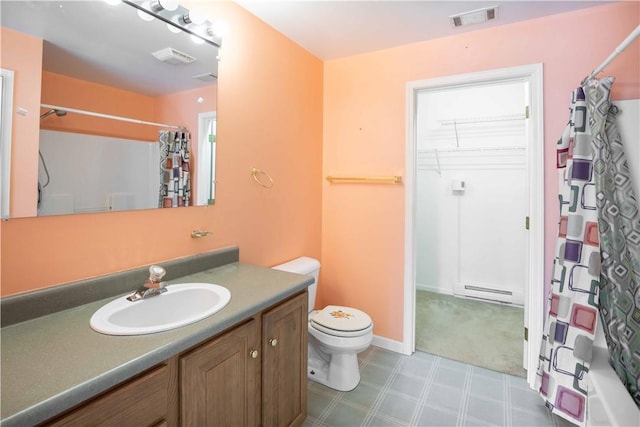 bathroom with toilet, visible vents, baseboard heating, and a shower with shower curtain