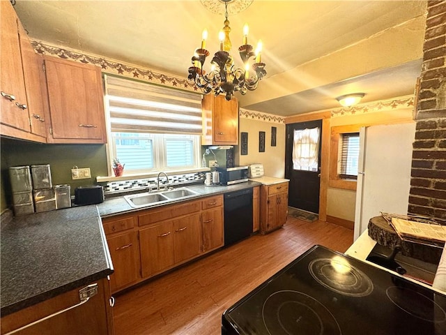 kitchen with electric range, wood finished floors, a sink, black dishwasher, and brown cabinetry