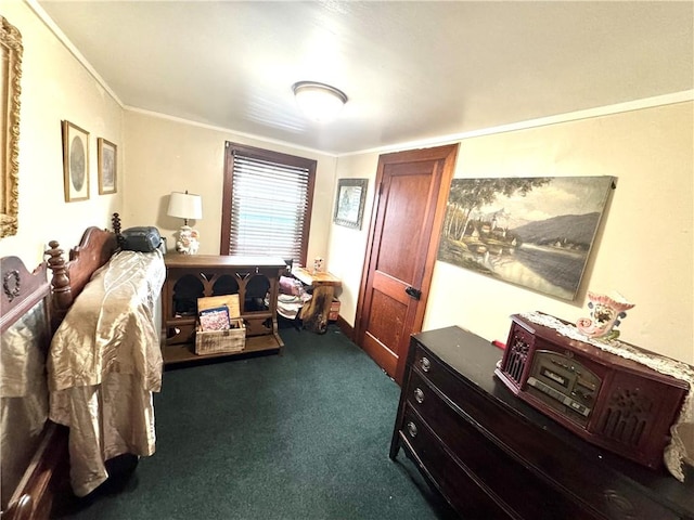 bedroom with dark colored carpet and crown molding