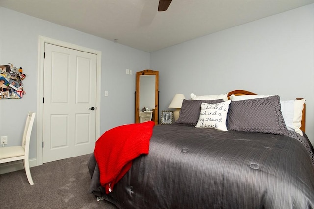 carpeted bedroom with a ceiling fan