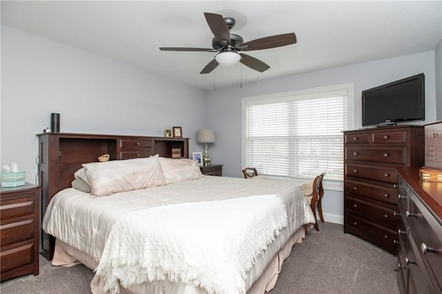 bedroom with a ceiling fan and light colored carpet