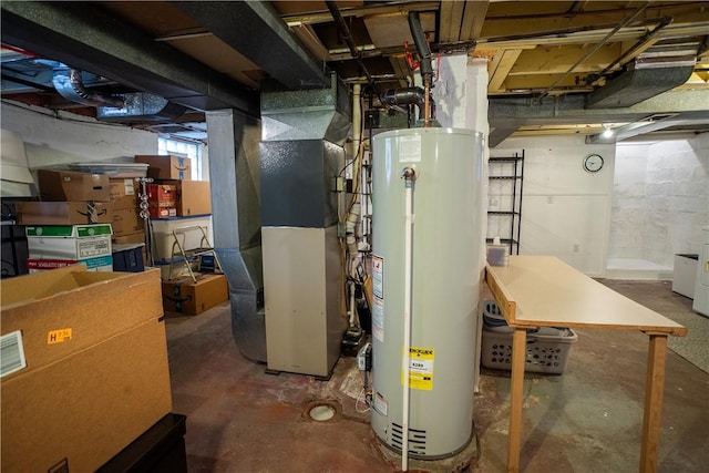 utility room with gas water heater and heating unit