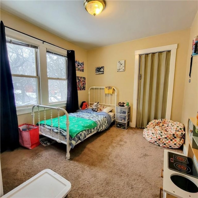 bedroom featuring carpet flooring