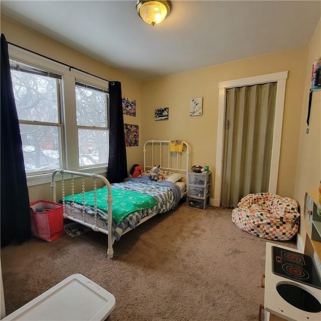 bedroom featuring carpet flooring