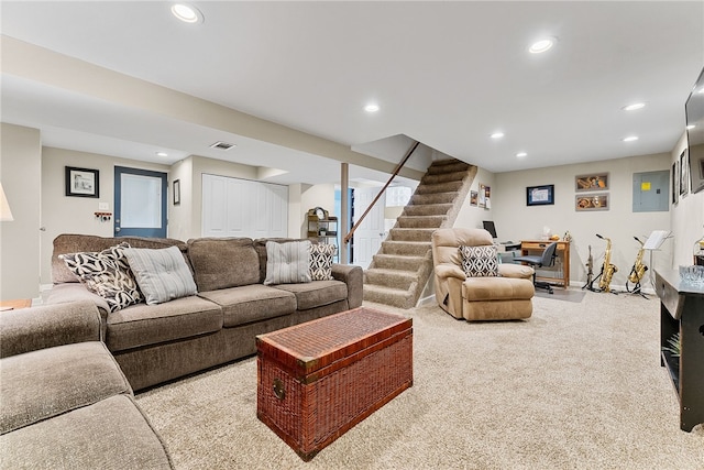 living room with carpet, stairs, visible vents, and recessed lighting