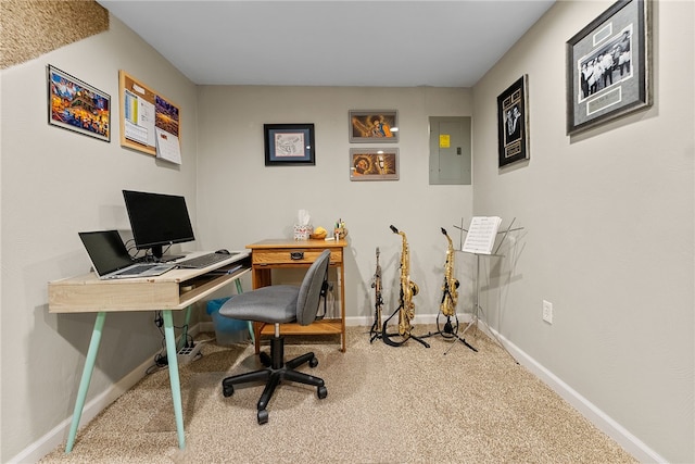 carpeted office featuring electric panel and baseboards