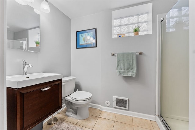 bathroom featuring visible vents, toilet, tile patterned flooring, vanity, and a shower stall