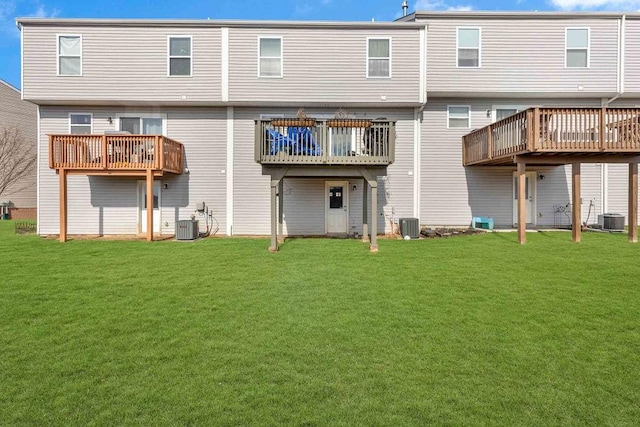 255 Grace Manor Dr, Robinson Twp Nwa, PA 15108 - rear view of house with central AC unit, a wooden deck, and a yard