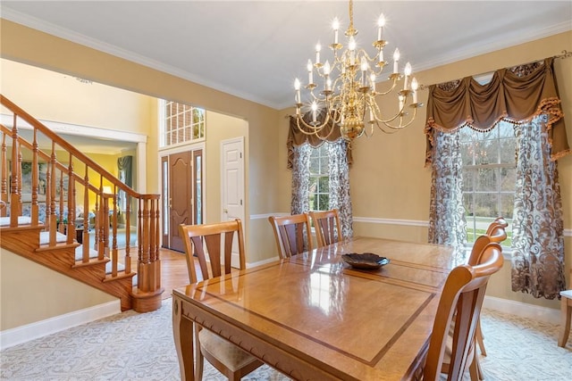 dining space featuring an inviting chandelier, ornamental molding, stairs, and baseboards