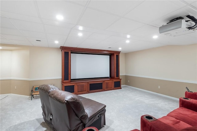 carpeted cinema room featuring recessed lighting and baseboards