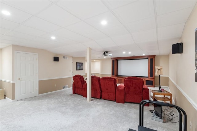 cinema with visible vents, a drop ceiling, carpet floors, and recessed lighting