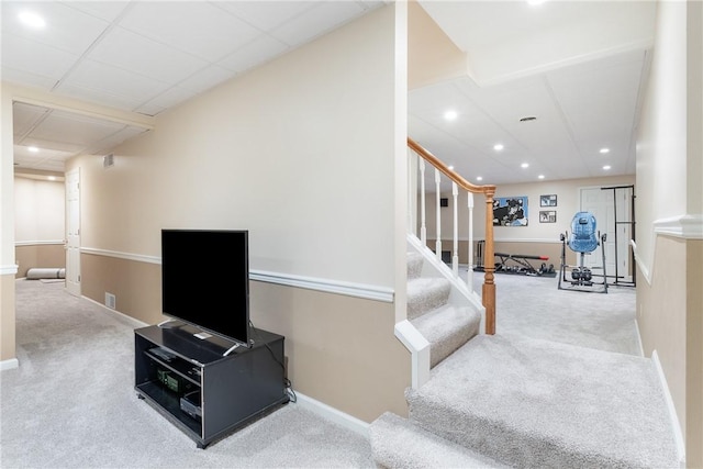 stairway with recessed lighting, visible vents, carpet, and baseboards