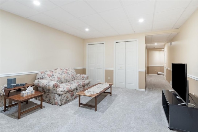 living area featuring recessed lighting and carpet floors