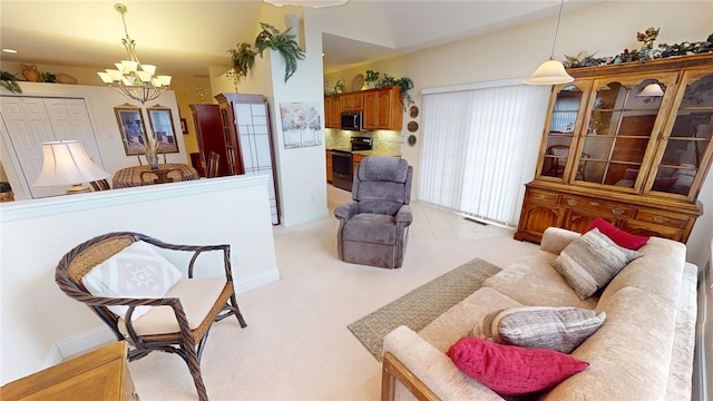 living area featuring light carpet and a chandelier