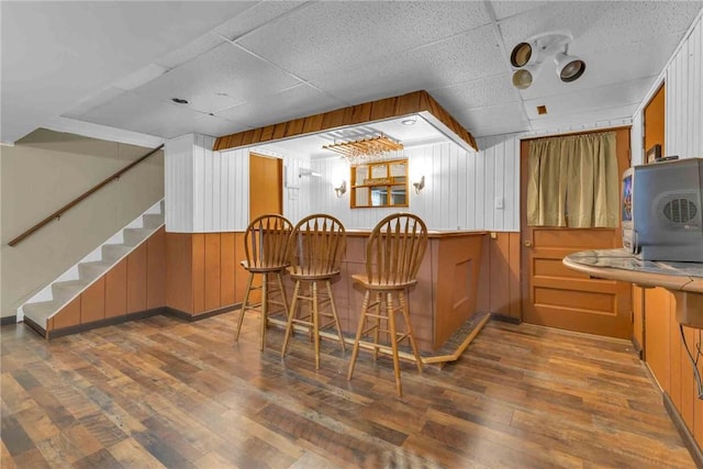 129 Birch St, Brighton Twp, PA 15009 - indoor dry bar with wood-type flooring, stairway, baseboards, and a drop ceiling