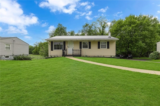 129 Birch St, Brighton Twp, PA 15009 - view of front of house featuring covered porch, a front yard, a chimney, and metal roof