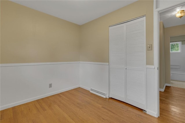 129 Birch St, Brighton Twp, PA 15009 - unfurnished bedroom with light wood-style flooring, a closet, and baseboards