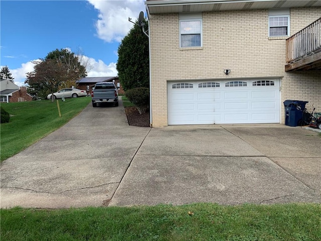 view of property exterior with a yard, driveway, brick siding, and an attached garage