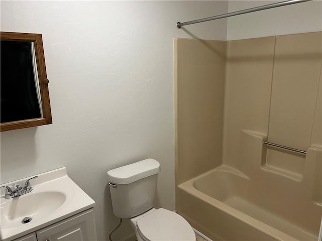 full bath featuring toilet, bathing tub / shower combination, and vanity