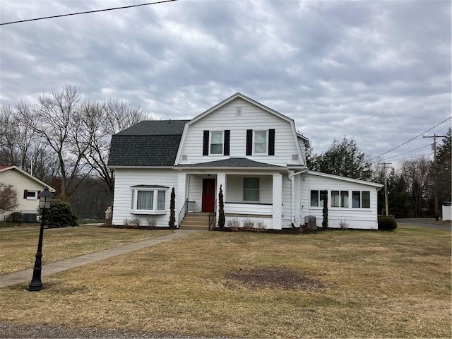 dutch colonial with a front lawn, roof with shingles, and a gambrel roof