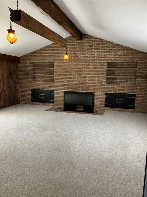 225 Country Club Rd, Penn Twp But, PA 16002 - unfurnished living room with a glass covered fireplace, carpet flooring, and brick wall