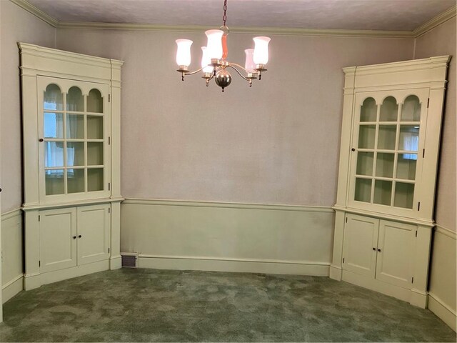 225 Country Club Rd, Penn Twp But, PA 16002 - unfurnished dining area with dark carpet, a chandelier, and crown molding