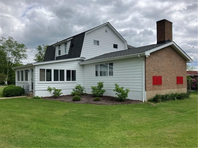 225 Country Club Rd, Penn Twp But, PA 16002 - view of side of home with roof with shingles, a yard, and a chimney