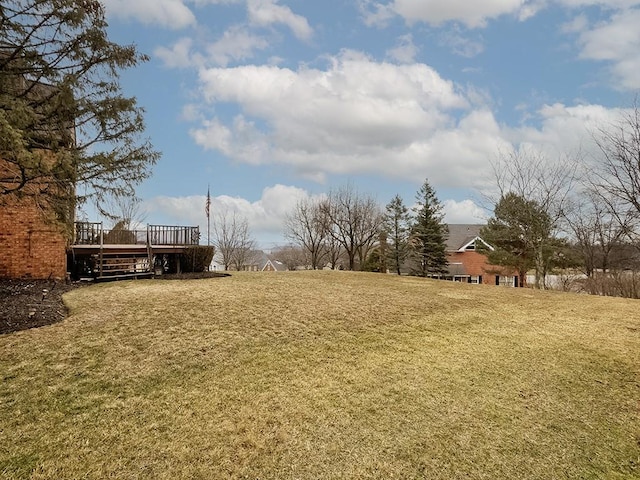 view of yard with a deck