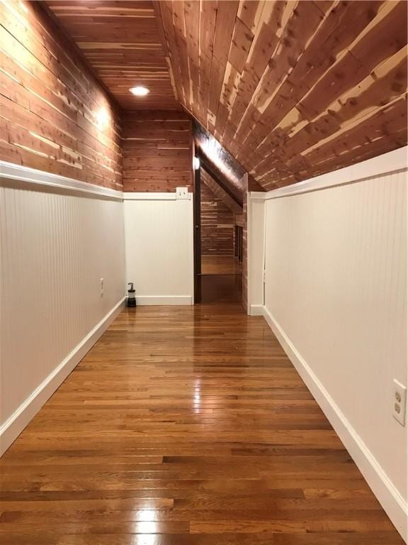 bonus room featuring wood-type flooring, wooden ceiling, and vaulted ceiling