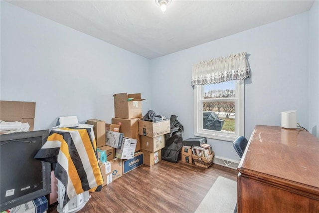 office featuring wood finished floors and baseboards