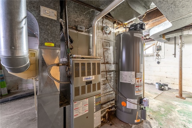 utility room with water heater