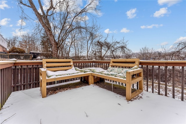 view of snow covered deck