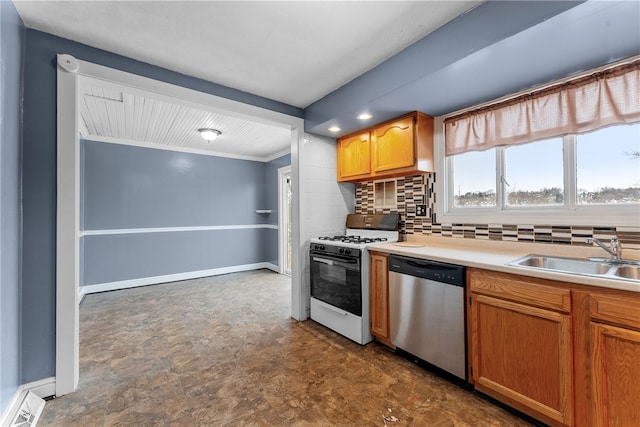 kitchen featuring gas range gas stove, light countertops, backsplash, a sink, and dishwasher