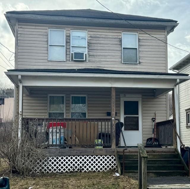 view of front of home featuring covered porch