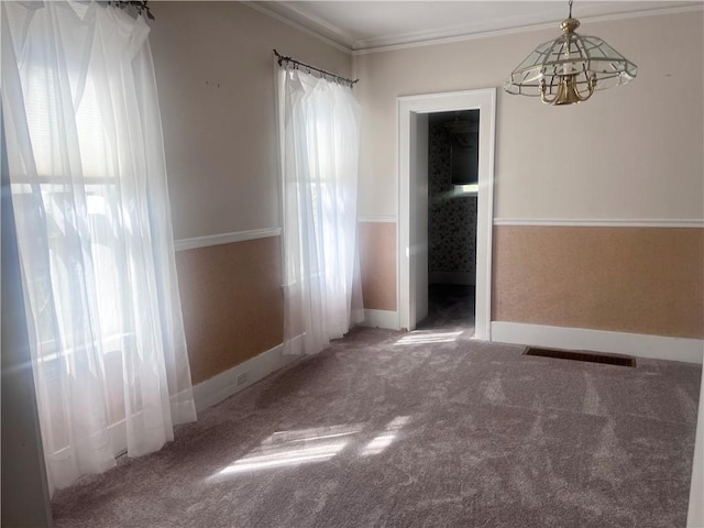 562 5th St, City Of But Ne, PA 16001 - carpeted empty room with a chandelier and ornamental molding